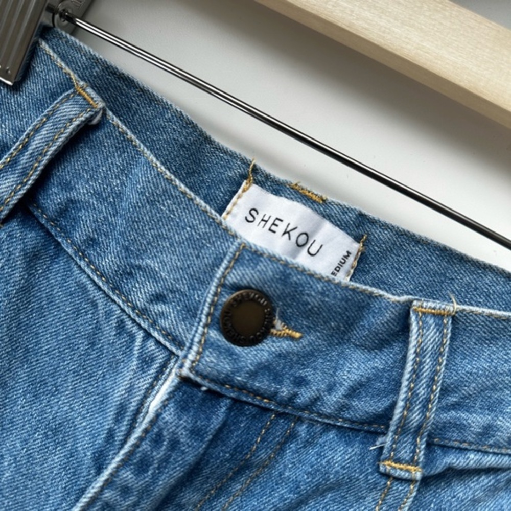 SHEKOU Baggy Medium Wash Jeans